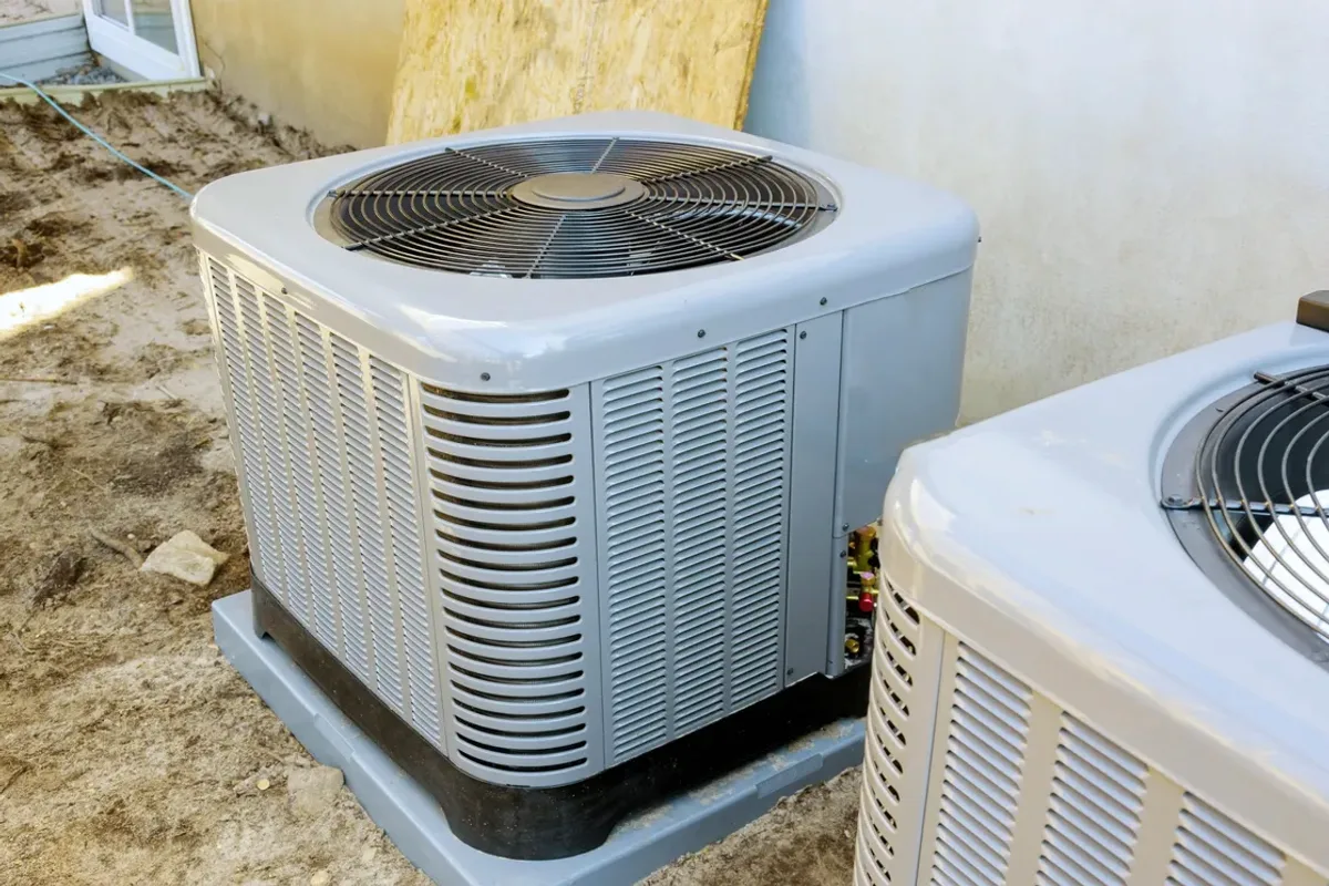 Two outdoor air conditioner condensers